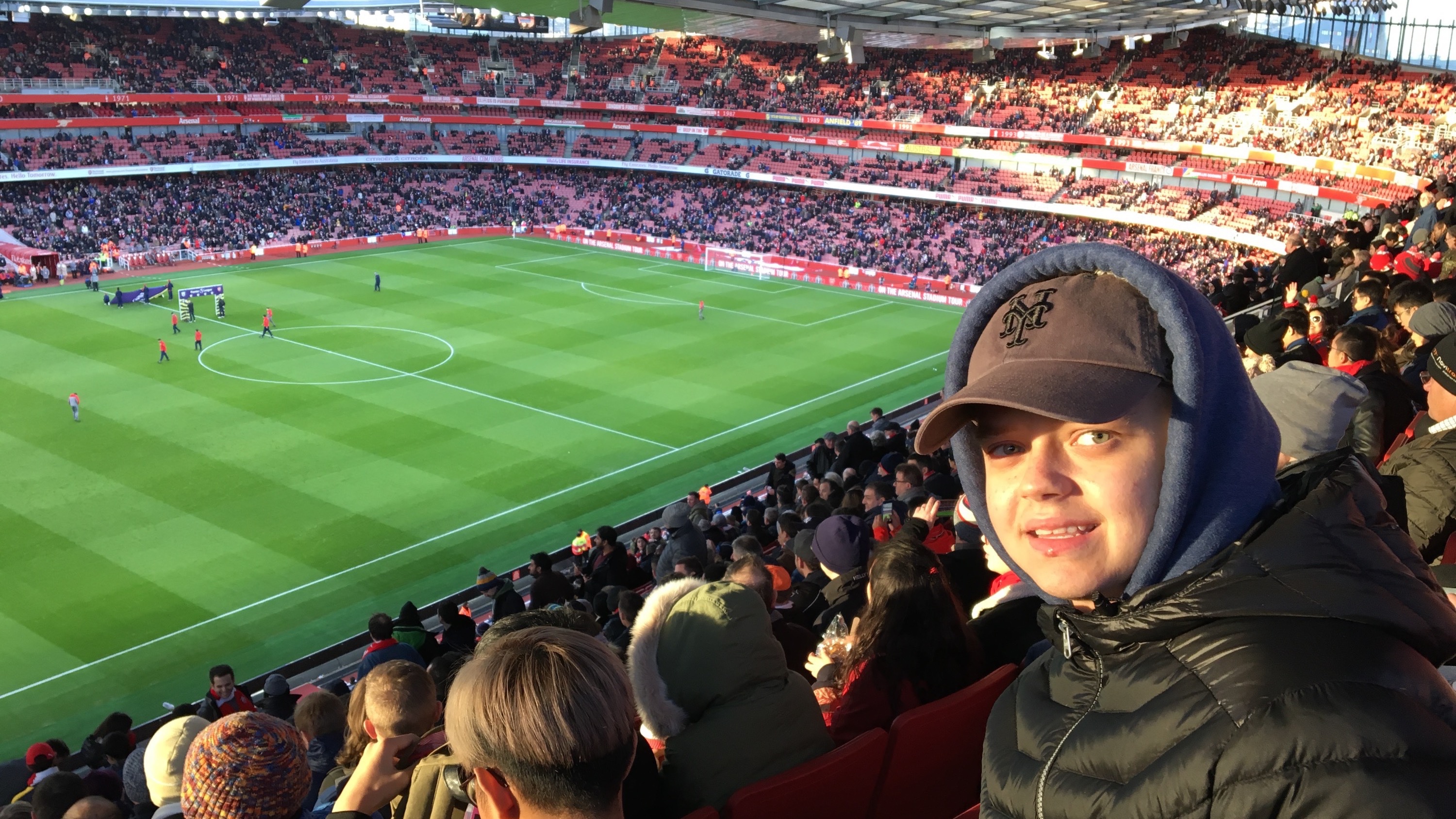 Sebastian Prawdzik enjoys the view from his seat at Arsenal's Boxing Day match